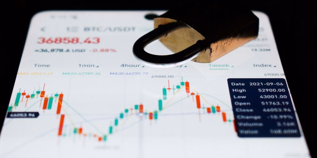 a close up of a business card with a stock chart on it