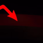 German flag with a downward arrow overlay.